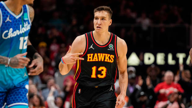 Bogdan Bogdanovic celebrates a made shot.